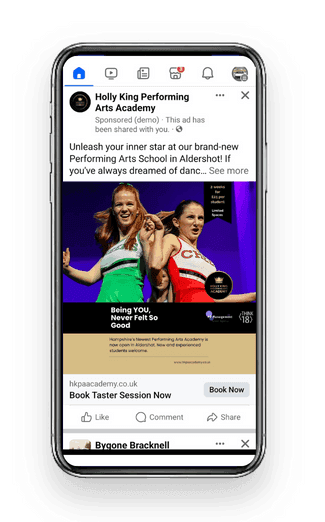 Holly King Performing Arts Academy sponsored Facebook advert on a phone