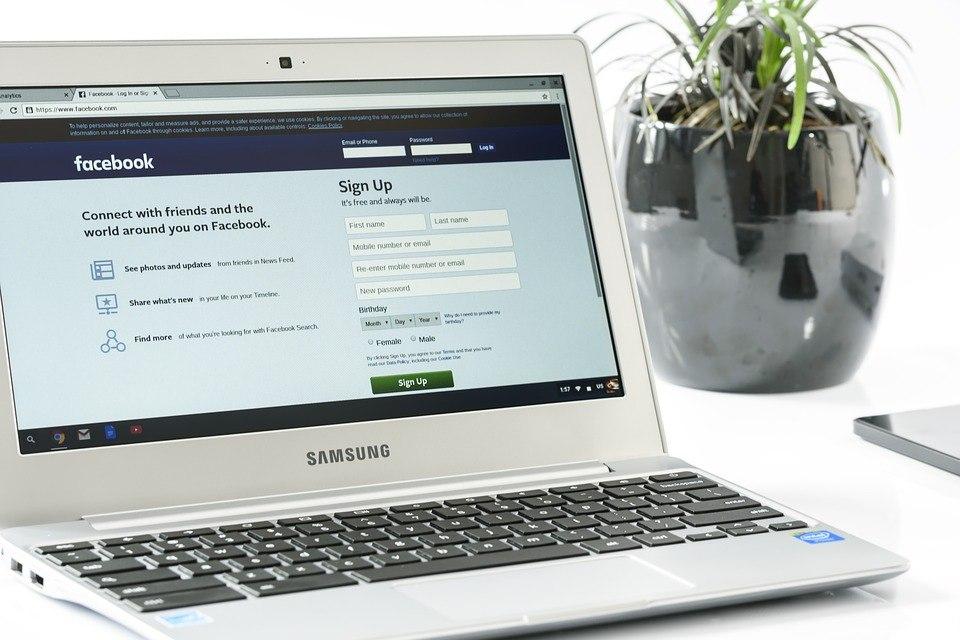 The Facebook login screen shown on a laptop being used for Social Media Marketing Surrey