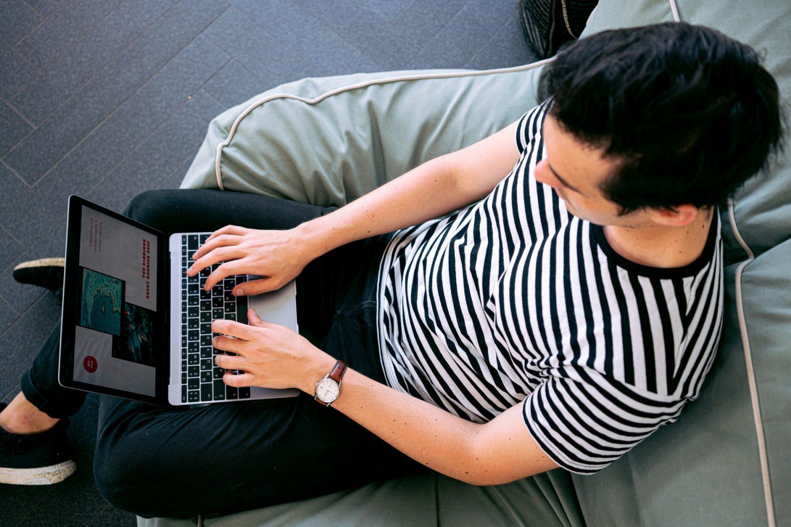 man on laptop. Surrey marketing agency