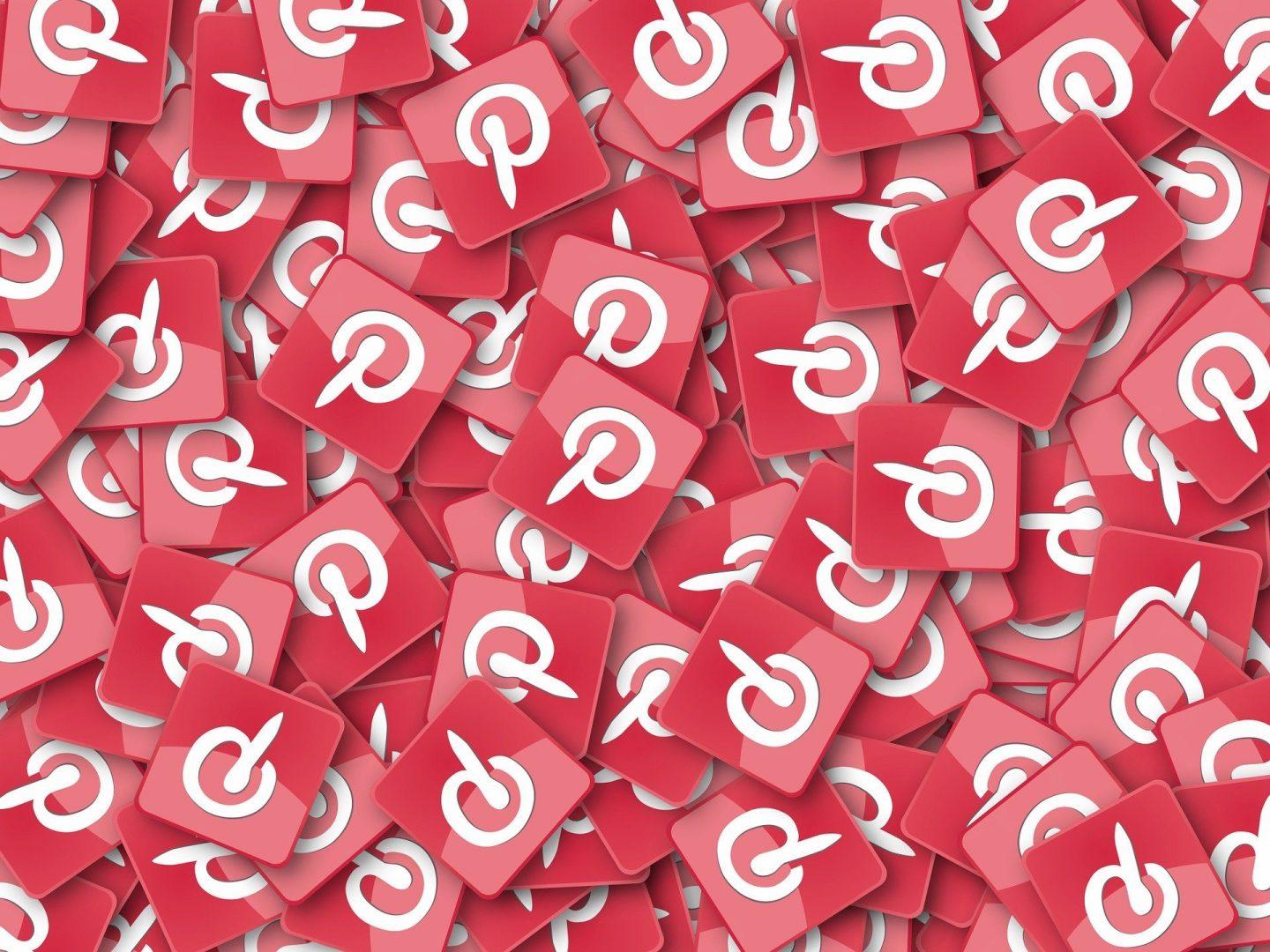 A pile of Pinterest logos