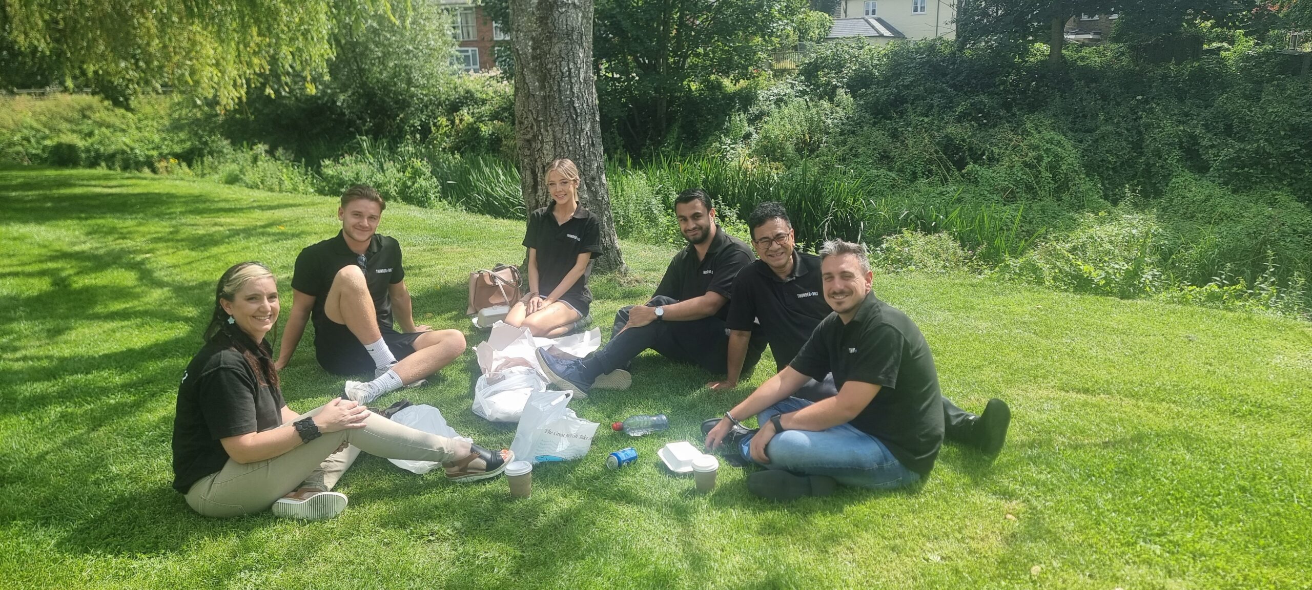 The Thunderbolt team picnicking in Gostrey Meadows