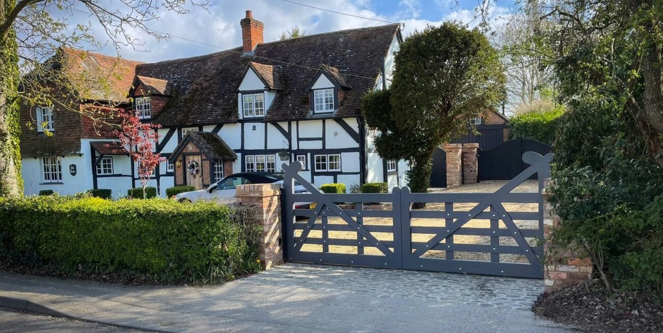 An example of Windlesham Gates' automated gates, designed to fit in with the style of a period house | Boosted SEO Rankings