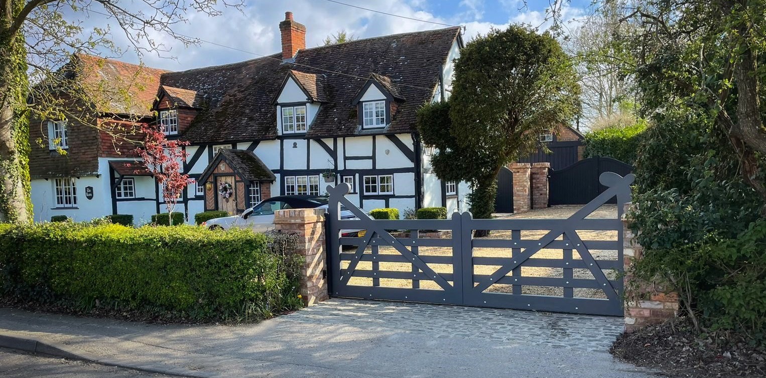 An example of Windlesham Gates' automated gates, designed to fit in with the style of a period house | Boosted SEO Rankings