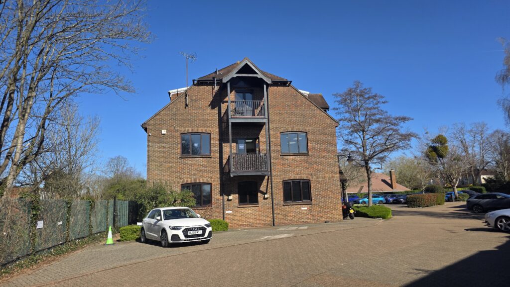 Woman updating her shop's Google Business Profile in store