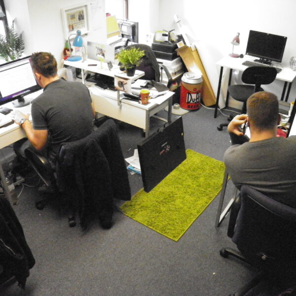 Several desks and staff hard at work in the first Thunderbolt Digital office