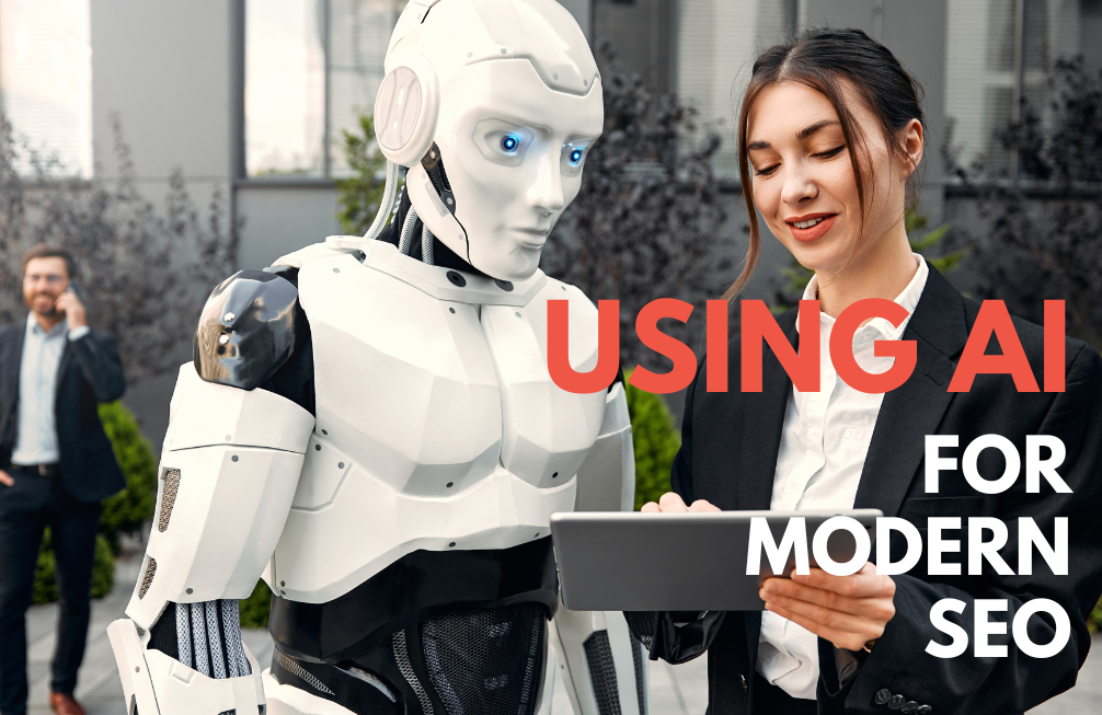 A woman and a smart robot looking at a tablet | Top SEO agency in Surrey
