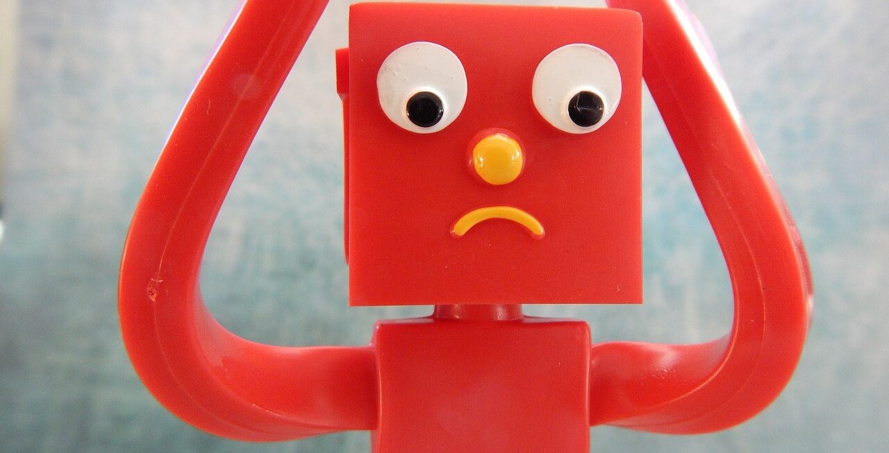 A confused robot who needs the help of a web design company near Guildford