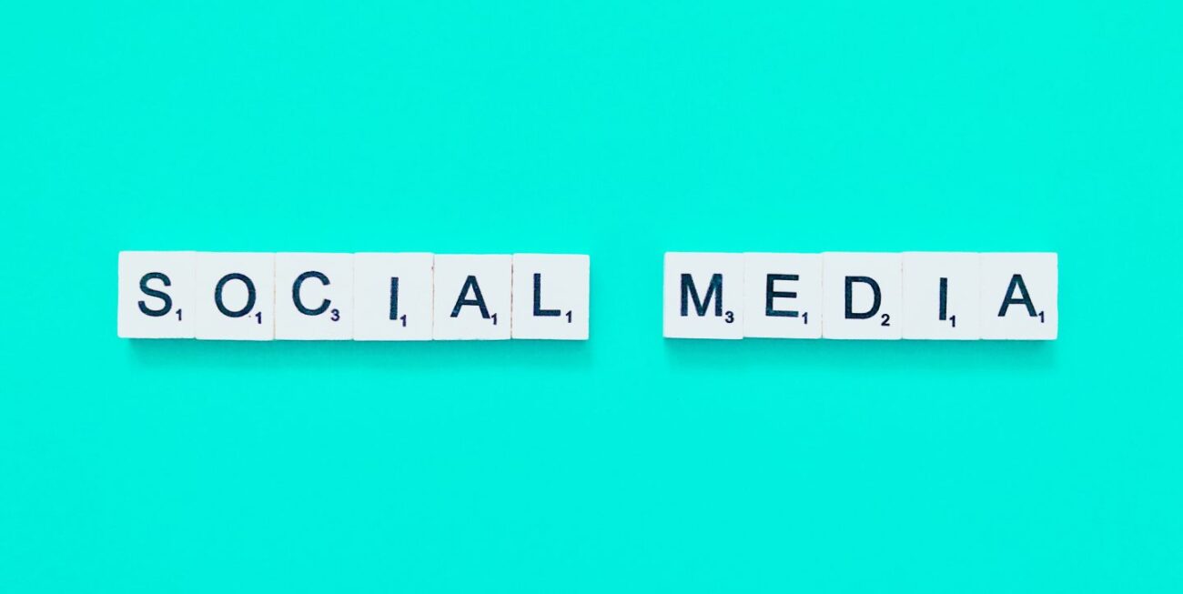 Scrabble letters spelling "social media"
