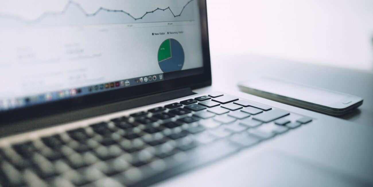 A Laptop with data on the screen being used in a digital marketing agency in Guildford