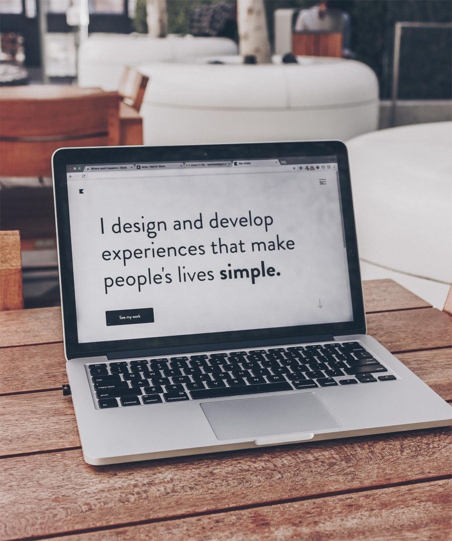 Macbook on desk web agency in Surrey