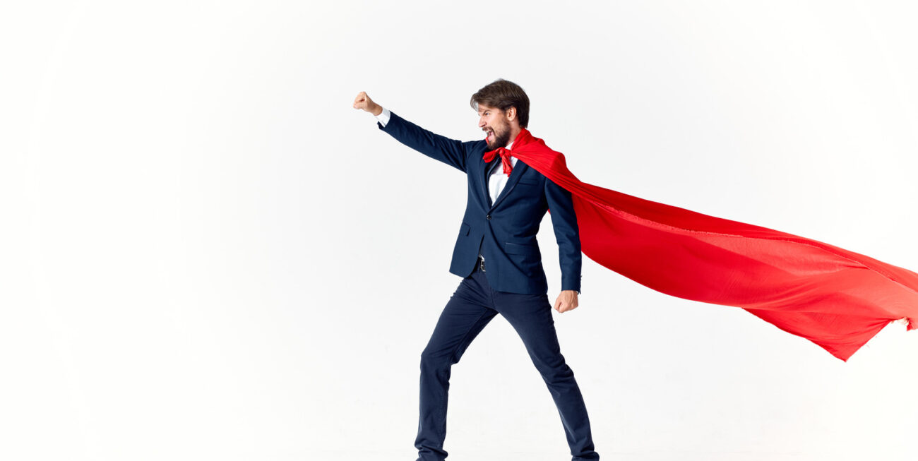 Businessman in a red superhero cape | Web Designers Surrey UK