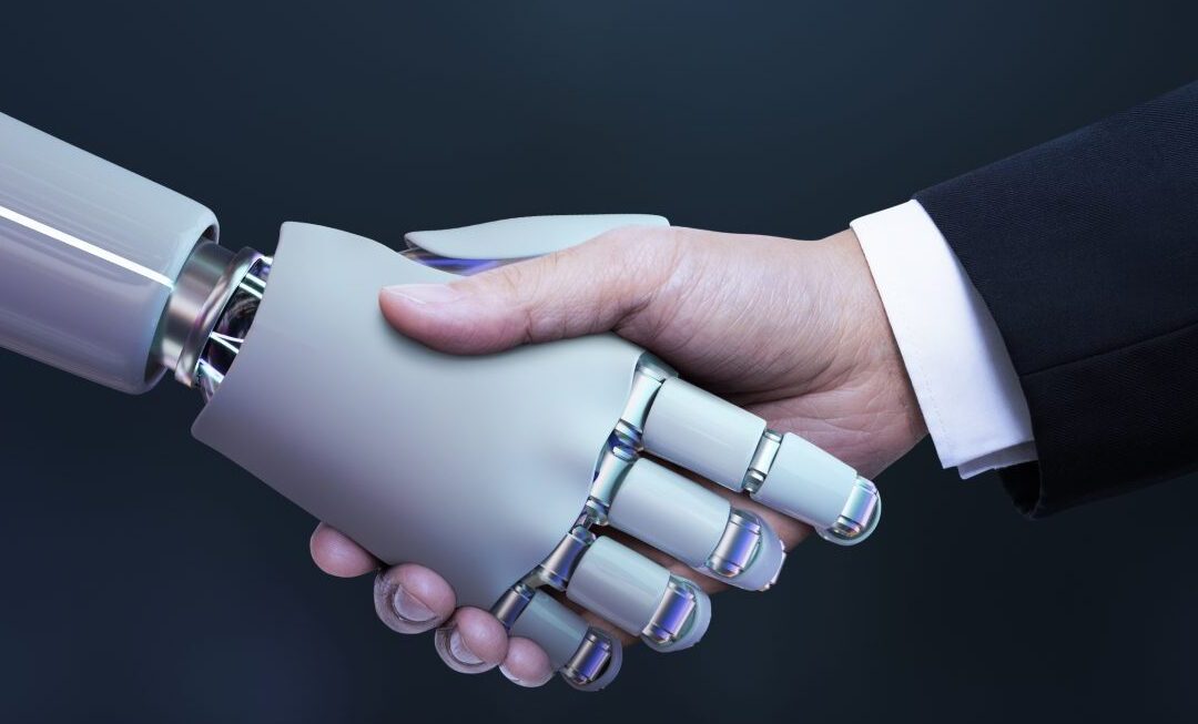 Robot shaking hands with business man wearinga suit