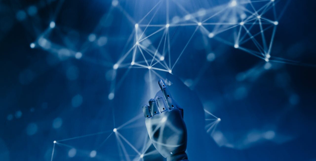 Robot hands reaching up into an AI network | Web Design and Online Marketing in Surrey