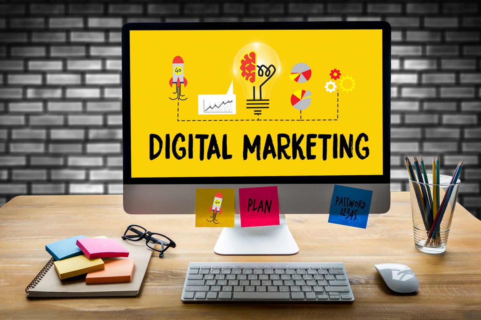 A bright yellow computer screen that says digital marketing | Digital marketing agency Surrey