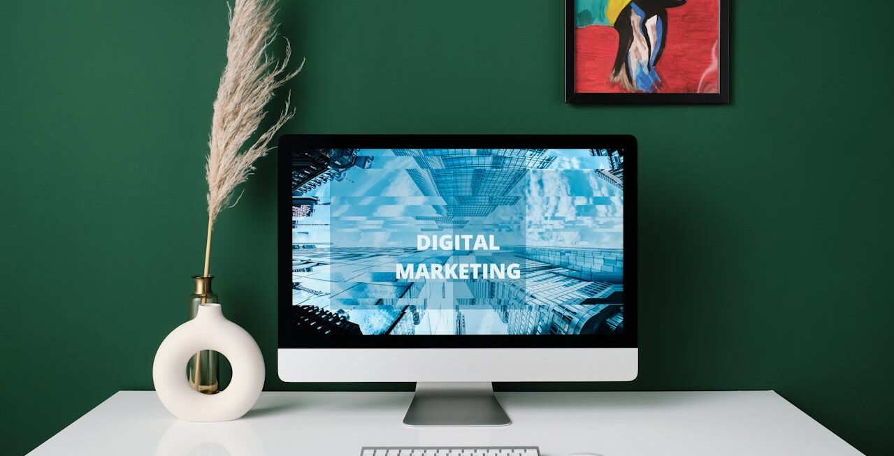 An office with a desktop computer that has "omnichannel digital marketing" on the screen