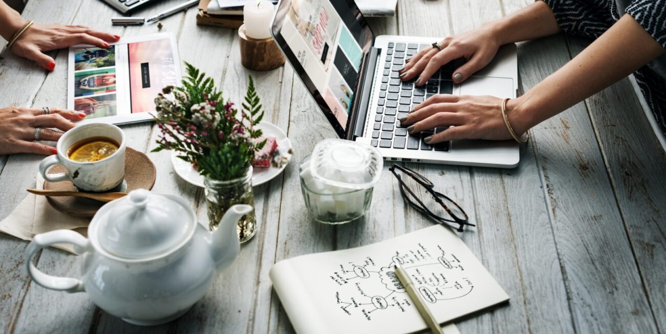 People working on opposite sides of a table