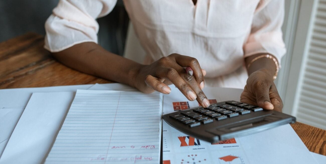 Woman using a calculator