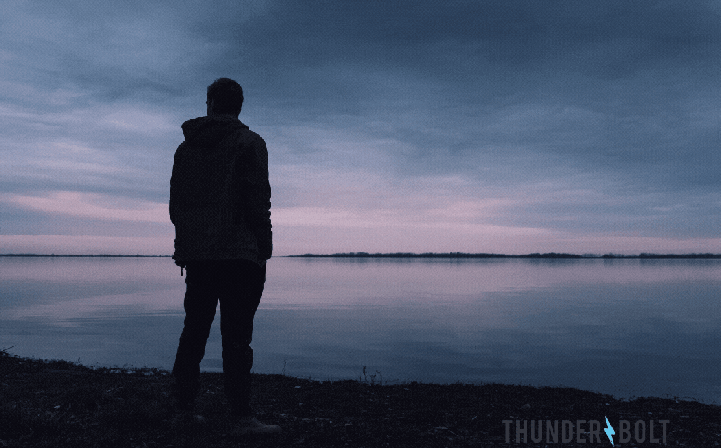 The silhouette of a man staring across a placid lake, with the title "Can Increasing Your SEO ROAS Be This Simple?"