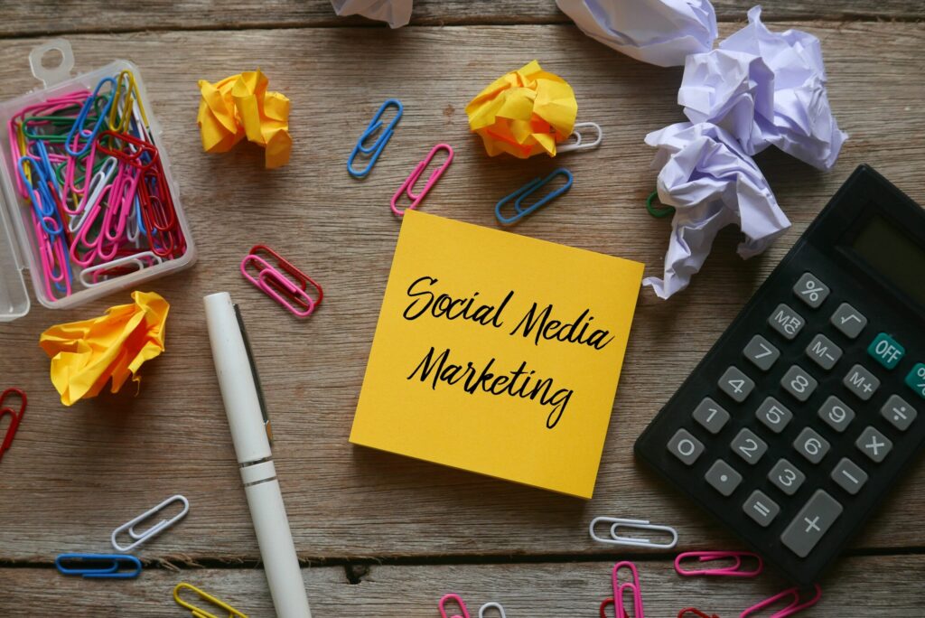 Stationery items surrounding social media marketing