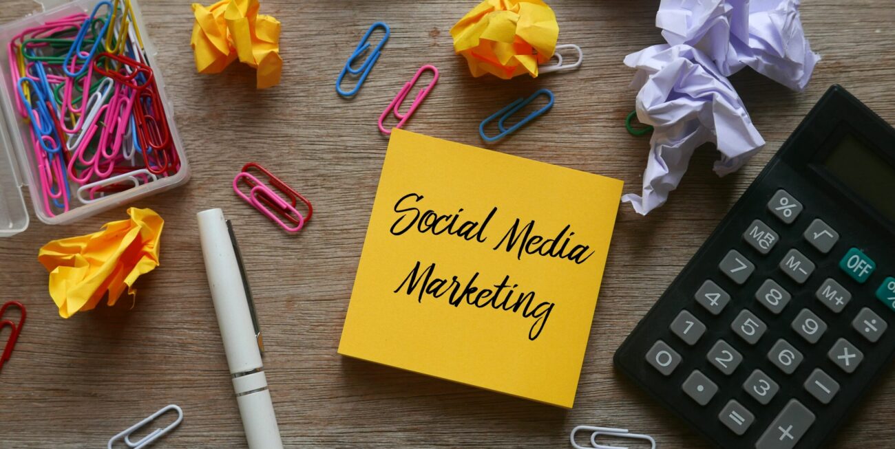 Stationery items surrounding social media marketing