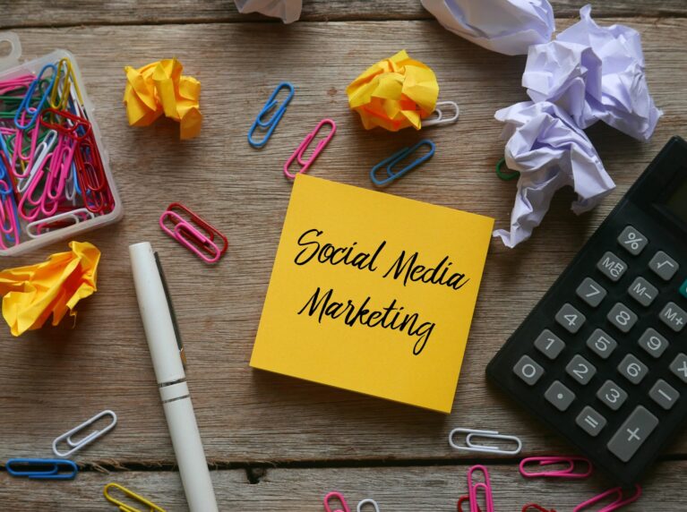 Stationery items surrounding social media marketing