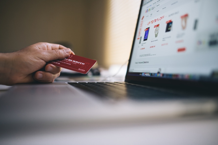Person buying online using a credit card | Web Design Surrey| Thunderbolt Digital