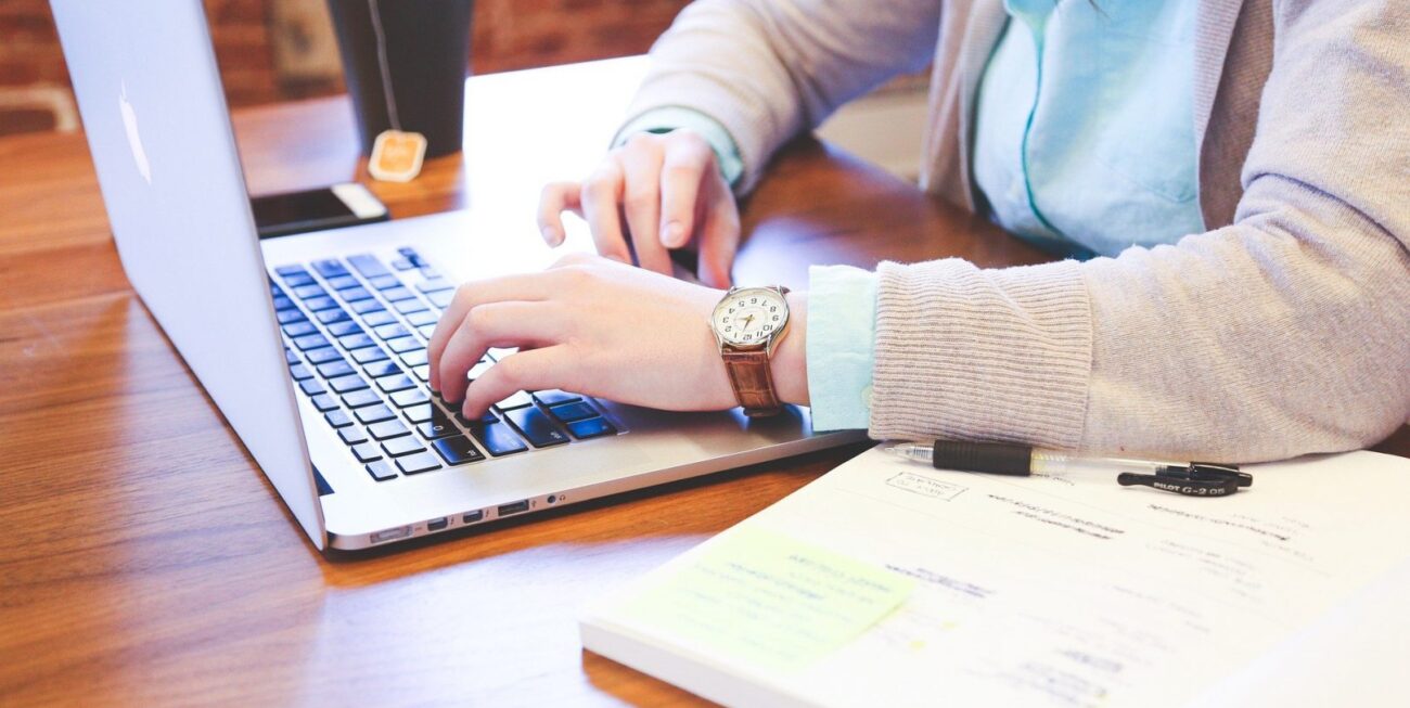 A woman working on web design at an online marketing company in Surrey